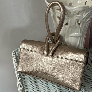 Chantecaille Loop Lock Clutch Metallic Rose Gold Wristlet Leather Bag